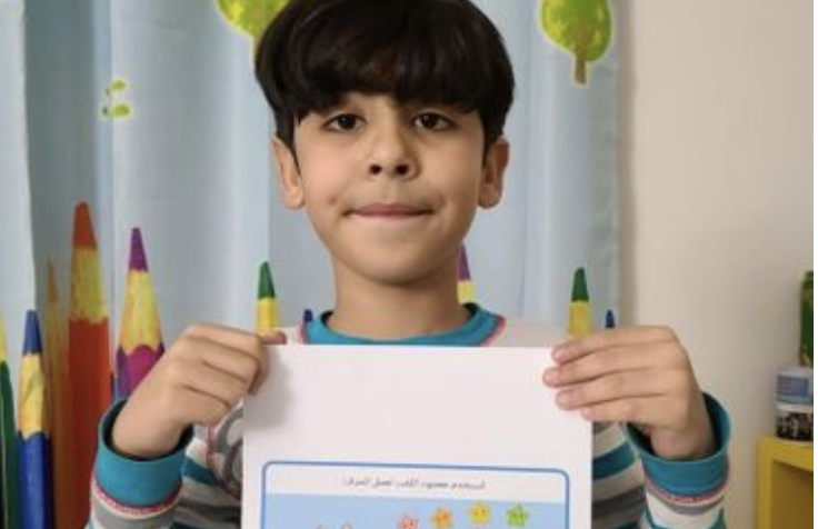 Child learning Quran and Arabic